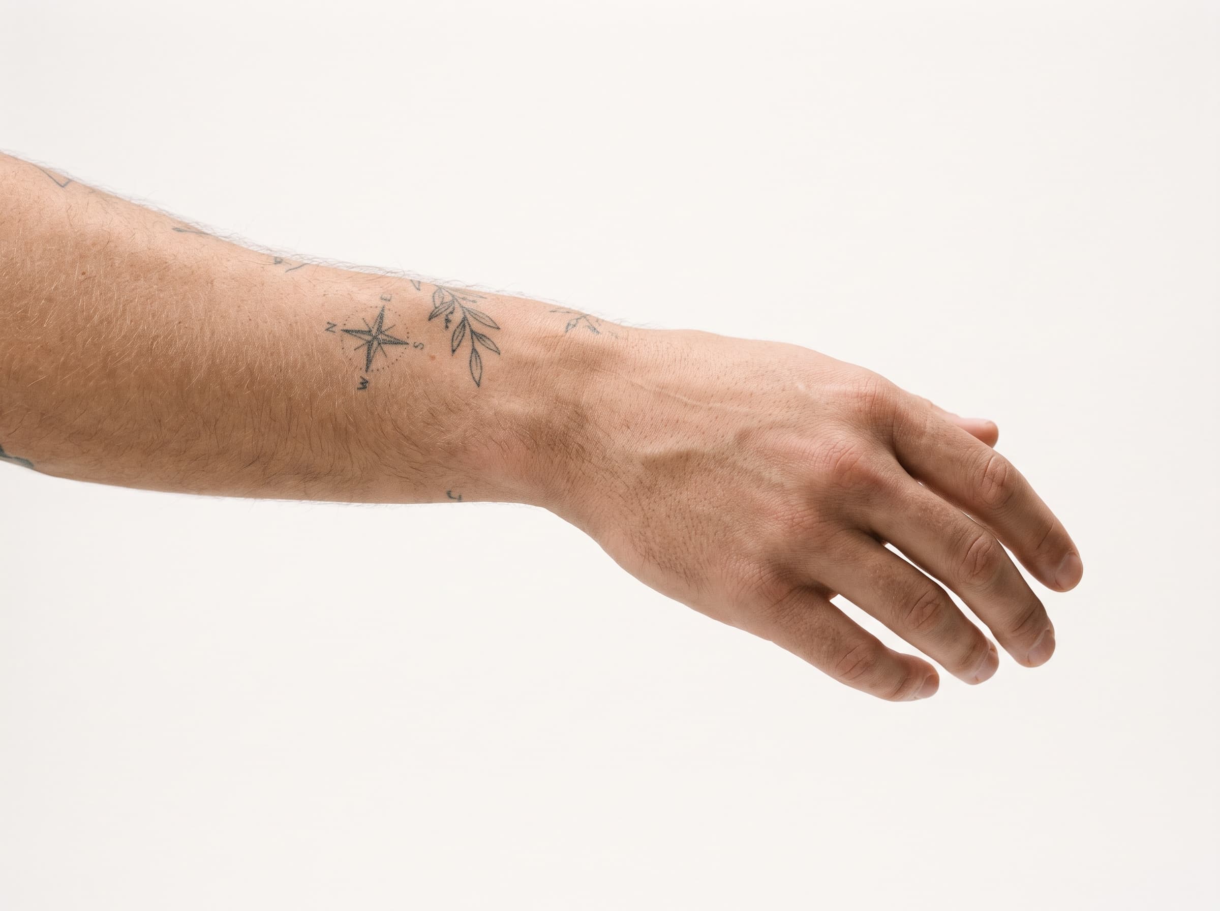 AI influencer with subtle arm tattoos