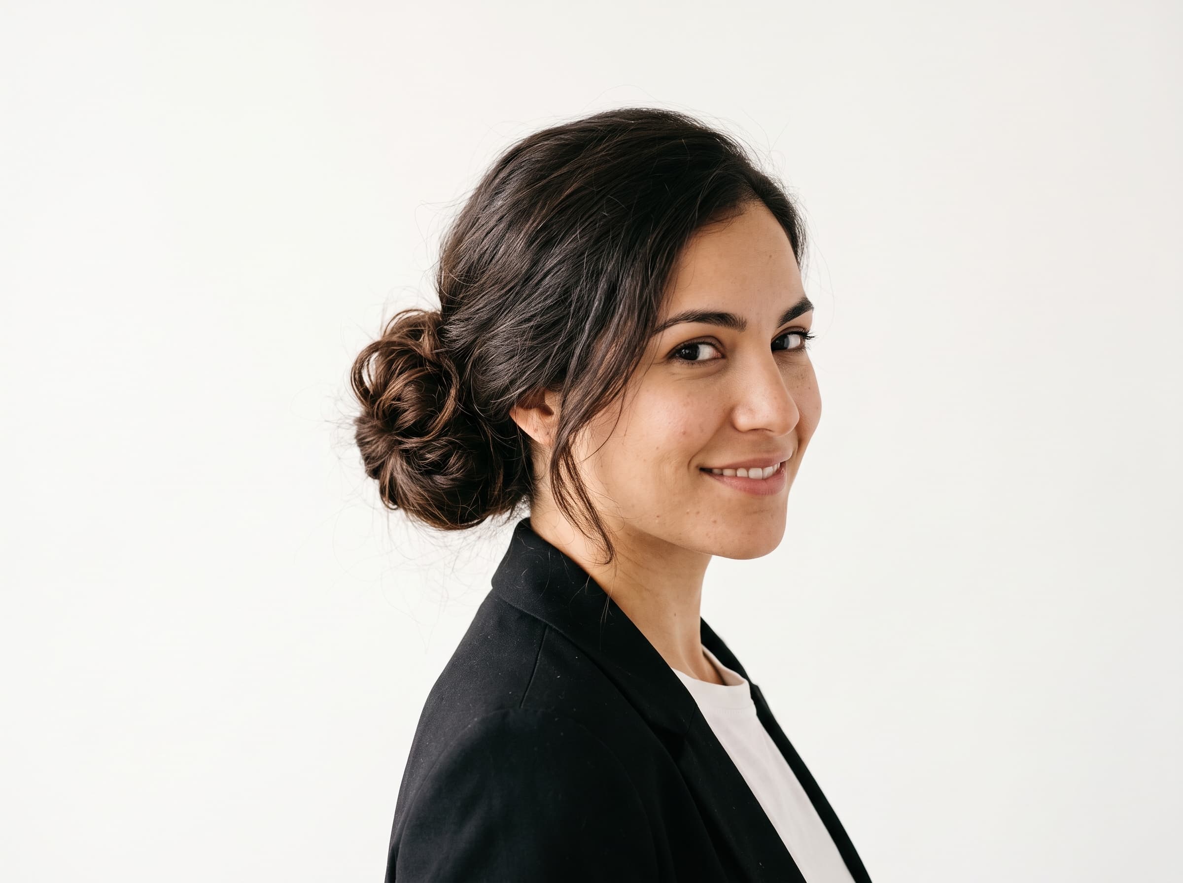 AI influencer with hair in a soft low bun