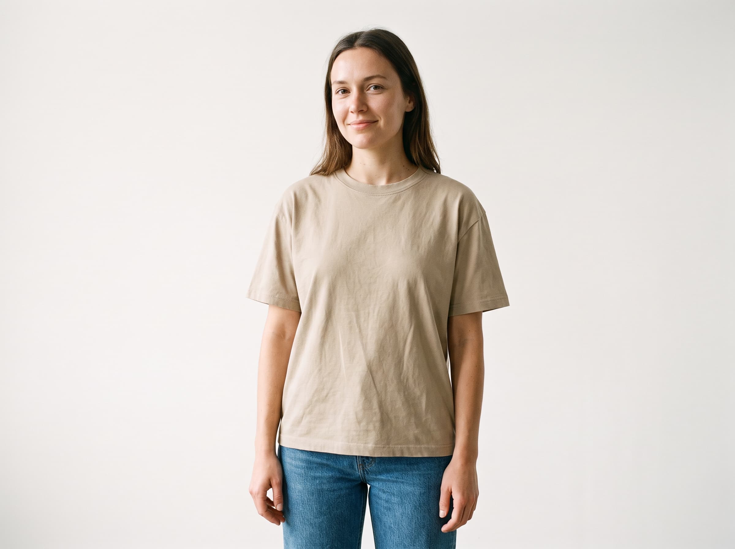 AI influencer in a casual outfit, a cotton crew-neck tee and jeans with natural fabric creases